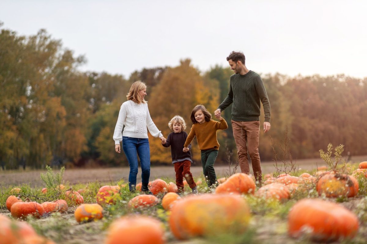 family at pumpkin patch